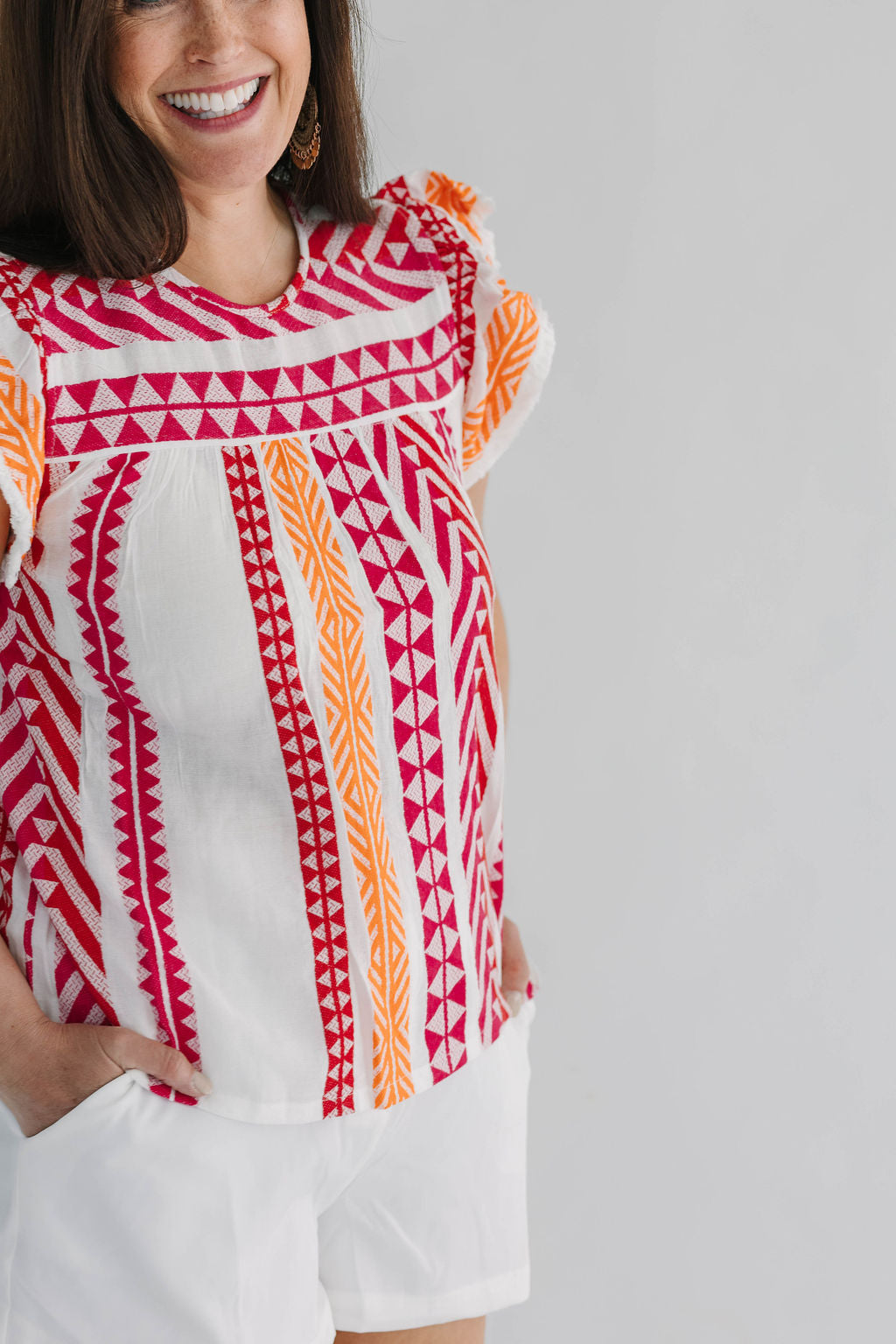 abstract pink and orange flutter short sleeve top