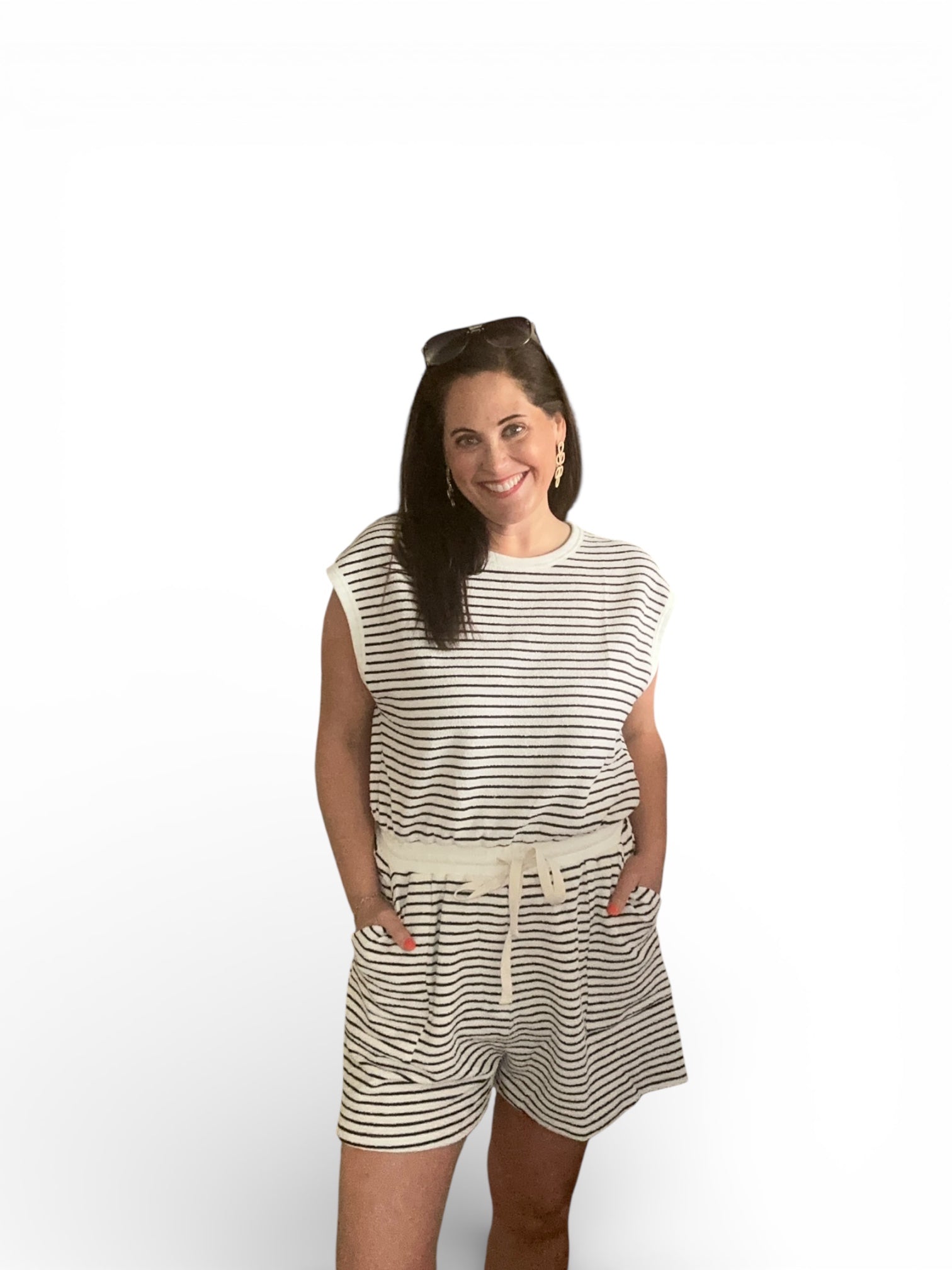 Cream and black stripe knit shorts romper with draw string and elastic waist and pockets