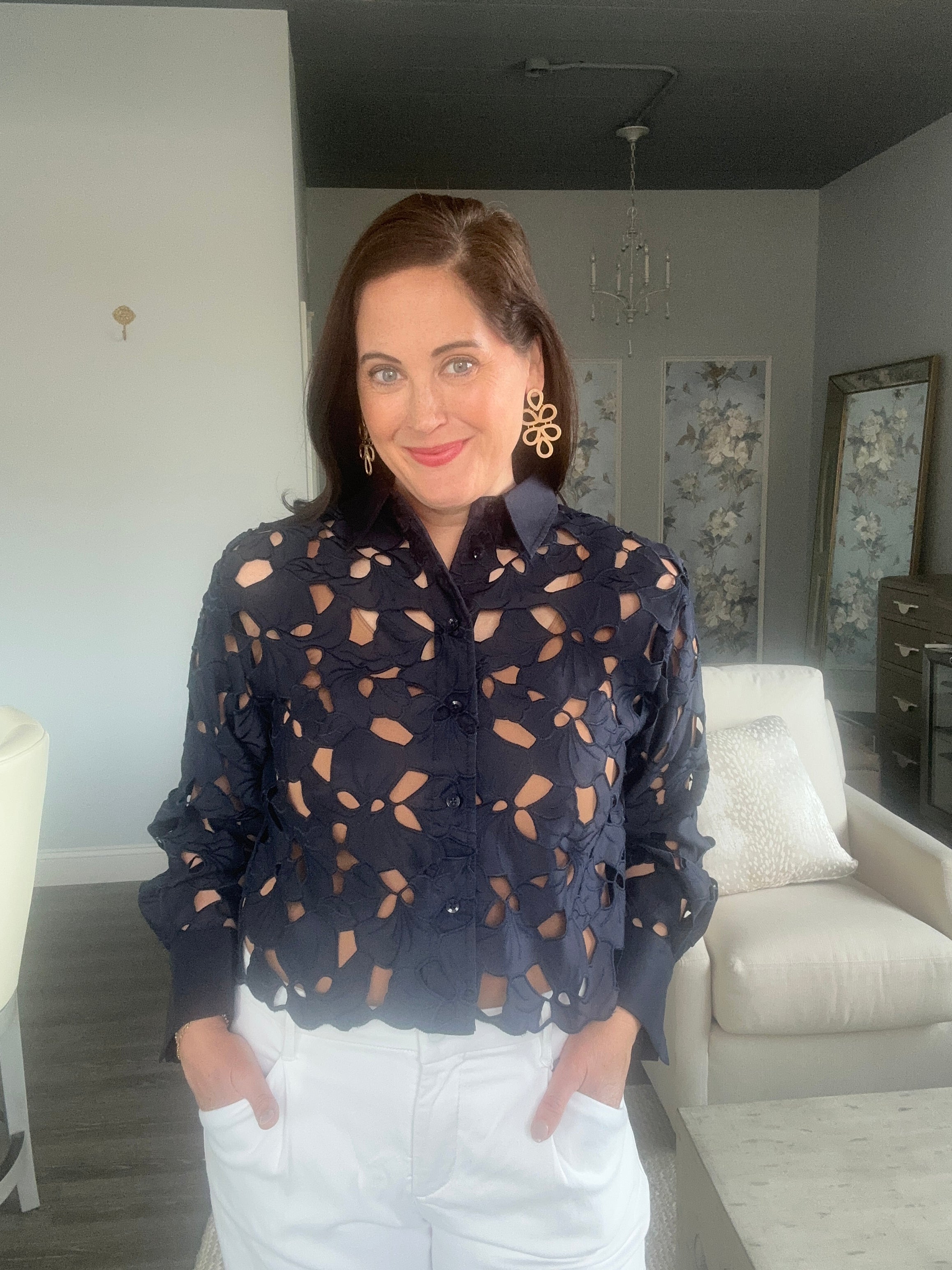 Navy eyelet shirt jacket with solid collar, cuff and back