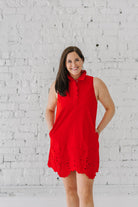red collar sleeveless dress with eyelet trim and scalloped button detail