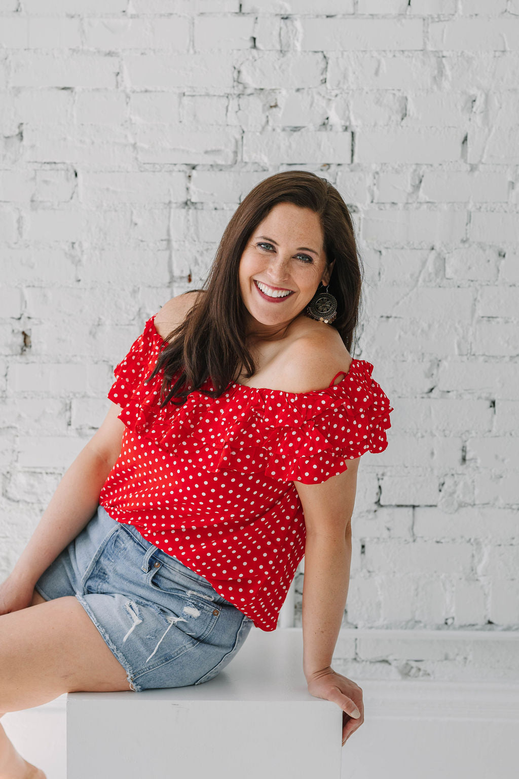 red and white polka dot off the shoulder ruffle top