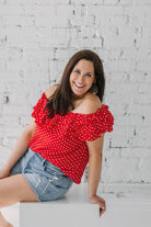 red and white polka dot off the shoulder ruffle top