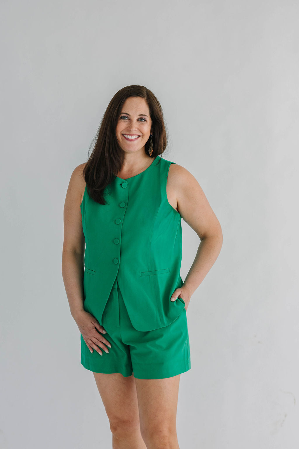 green trouser shorts with elastic back and clasp and zipper front