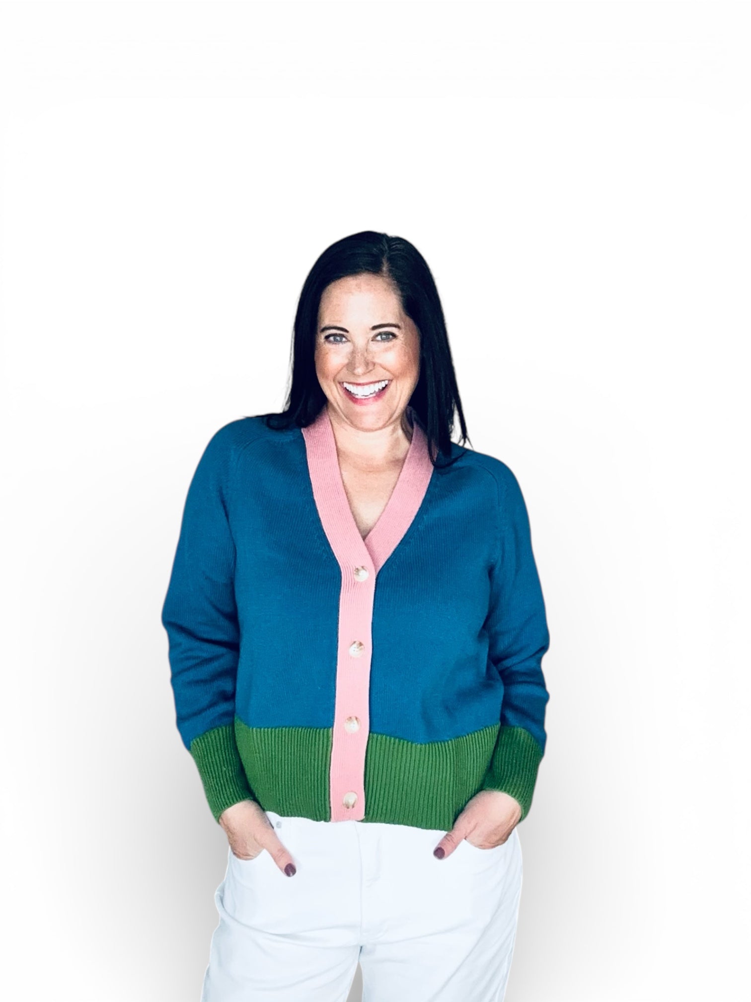 blue and green cardigan with a pink trim 