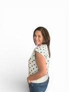  White Sleeveless sweater top with black Polka Dot 