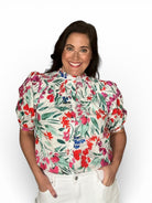 colorful floral button front short sleeve blouse with smock neck 