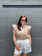 tan short sleeve v-neck top with white trim and flutter sleeve Solid Woven Top 