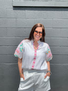 white v-neck stand collar short puff sleeve  with pink and green flower embroidered detail