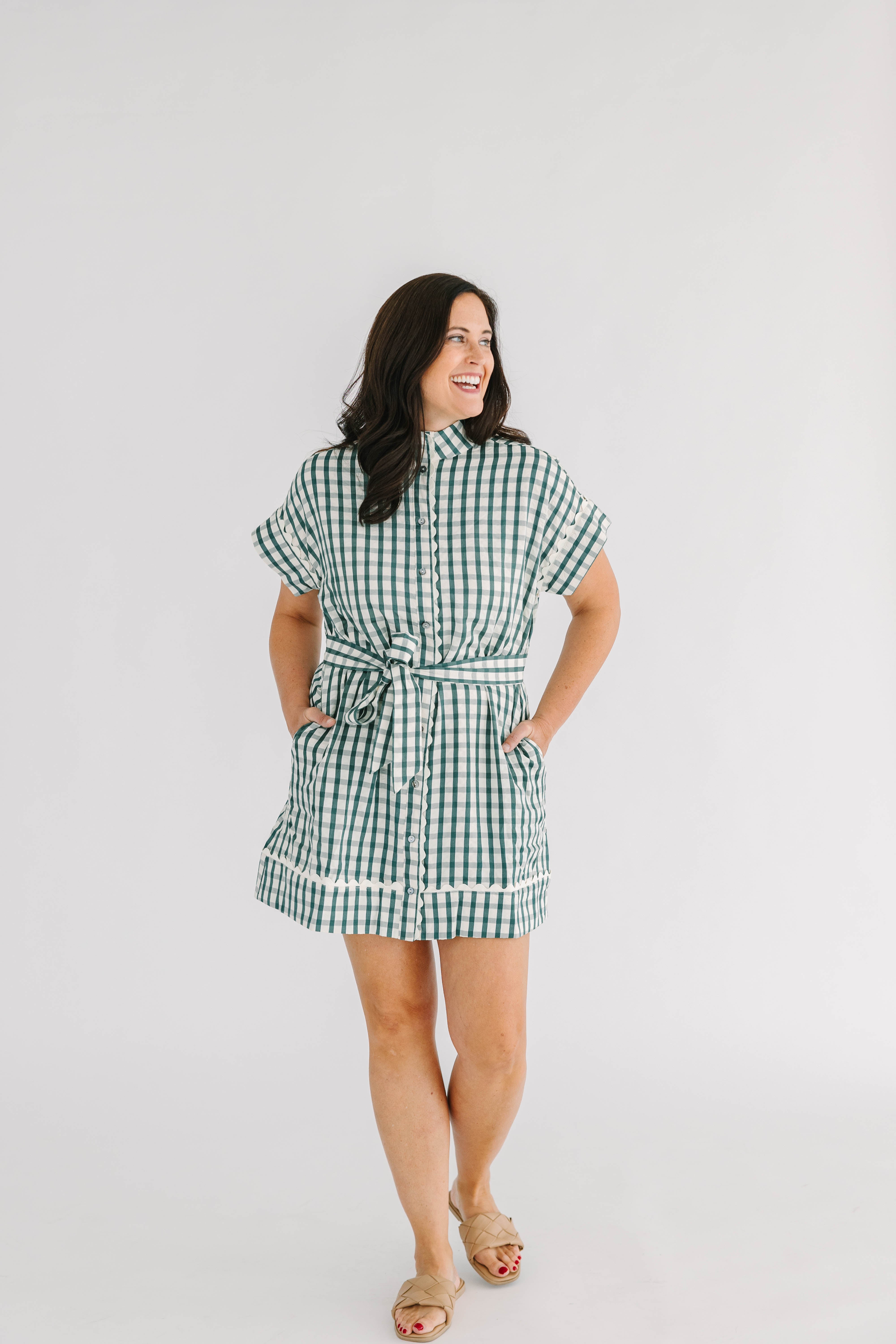 green and white checkered mini dress with button front and tie at waist scallop trim 