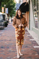 brown floral sleeveless midi dress