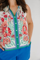 sleeveless halter floral top with button nonfunctional buttons and tie detail