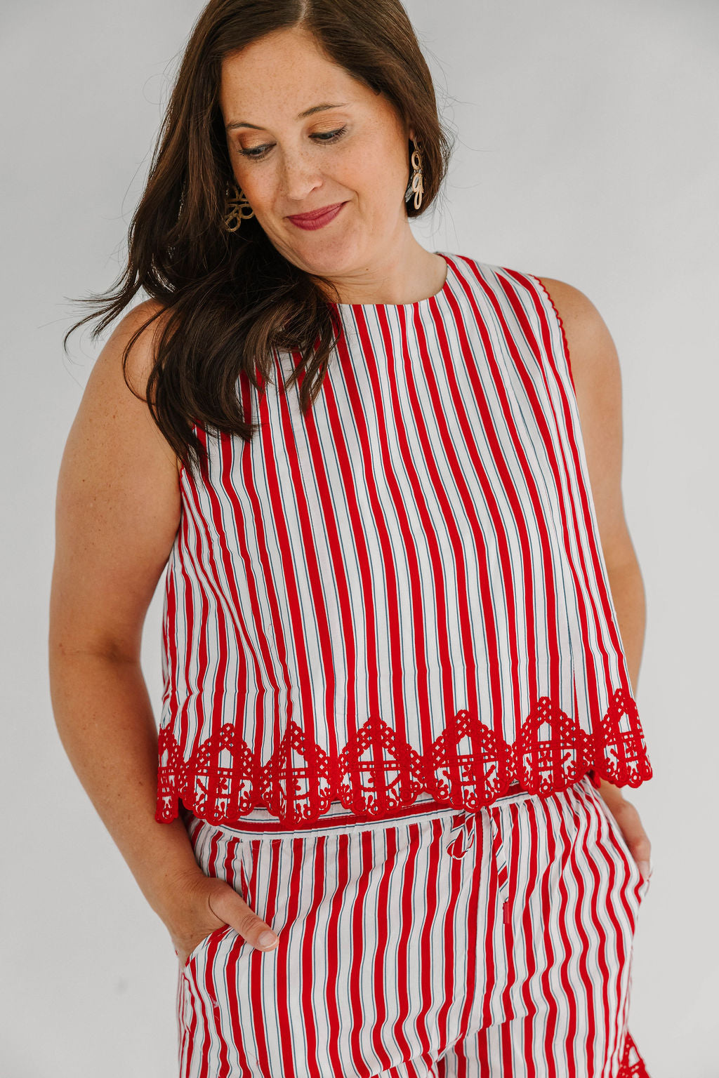 red and white striped top with lace embroidered details 