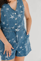 Denim romper with star pattern functioning button and zipper closure