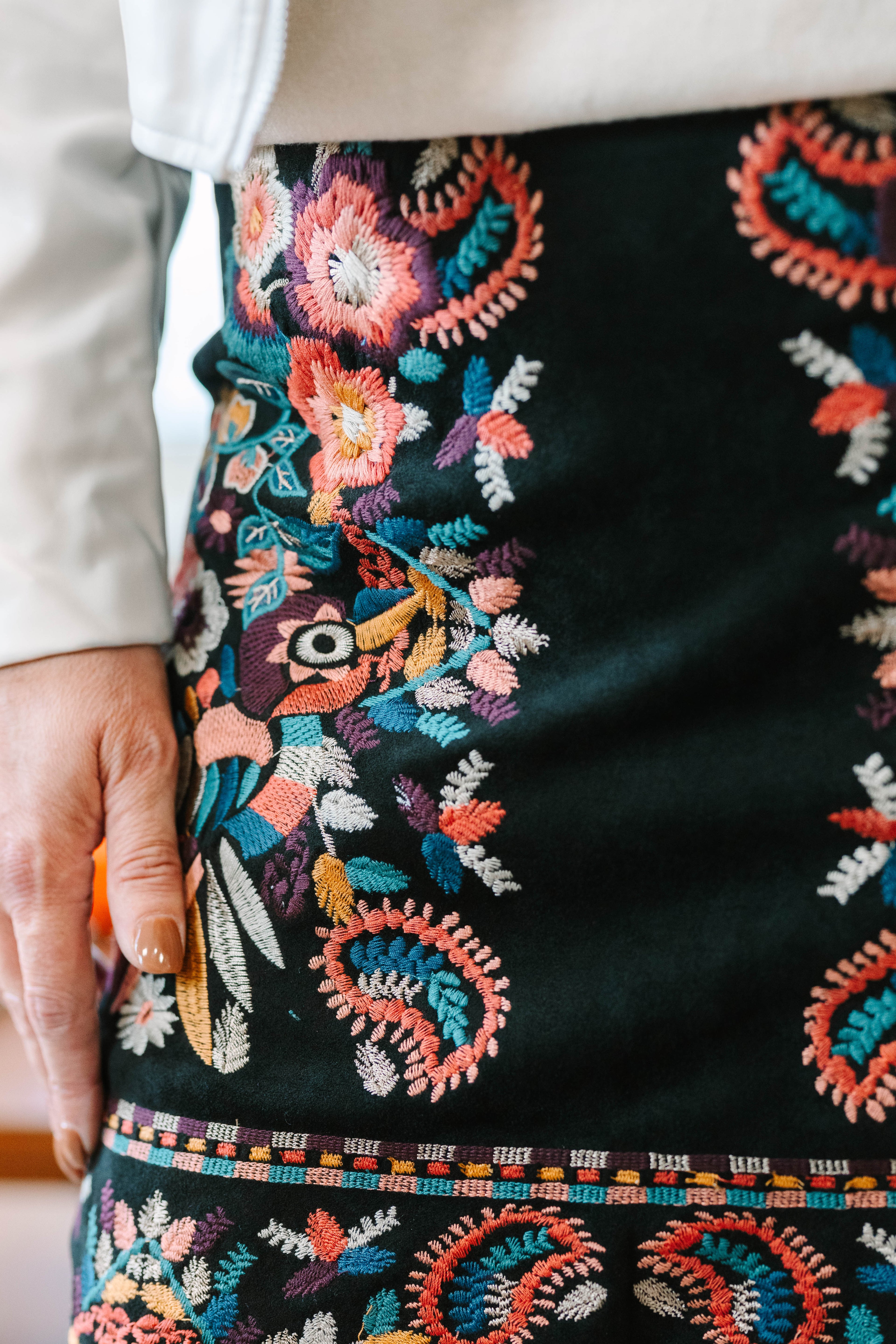 Maggie Black Suede Knit Mini Skirt with Colorful Embroidered Detail - The Girl on Ivy